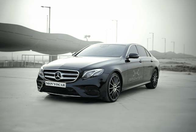 Movyocar Mercedes E Class Black car rental in dubai