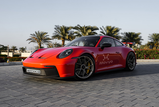 Movyocar Porsche Gt3 Orange car rental in dubai