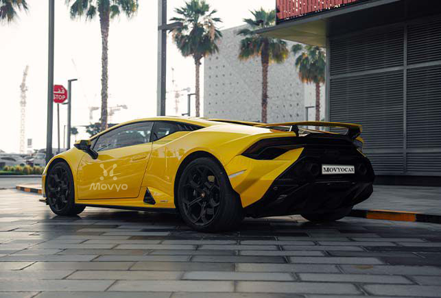 Movyocar Lamborghini Huracan Tecnica Yellow car rental in dubai