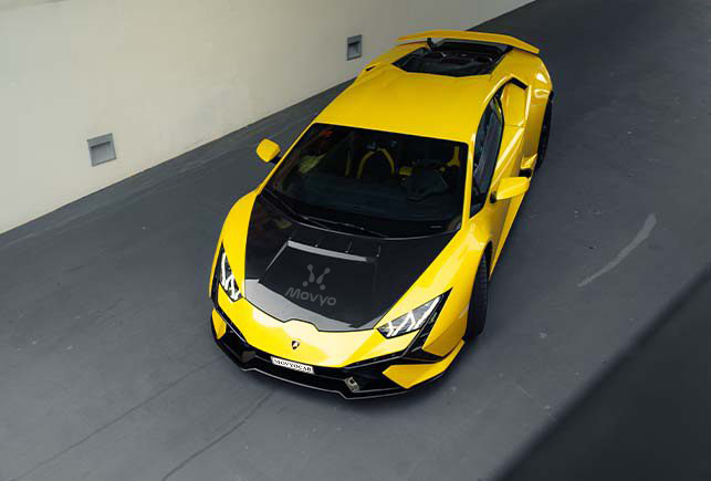 Movyocar Lamborghini Huracan Tecnica Yellow car rental in dubai