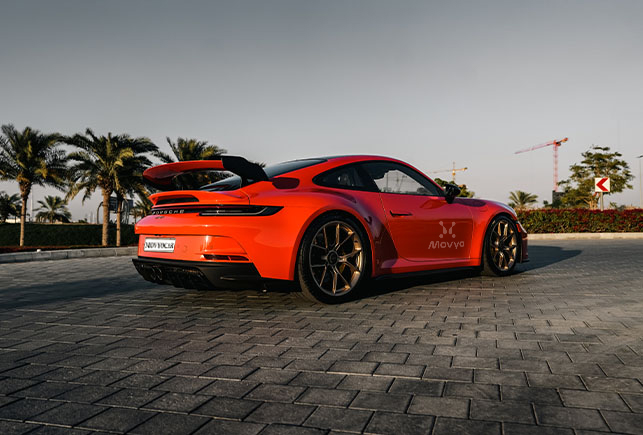 Movyocar Porsche Gt3 Orange car rental in dubai