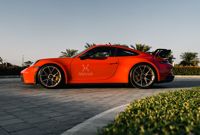 Movyocar Porsche Gt3 Orange car rental in dubai