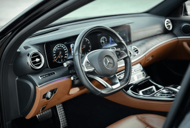 Movyocar Mercedes E Class Black car rental in dubai